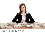 Beautiful woman very busy working on call center. Стоковое фото, агентство Ingram Publishing / Фотобанк Лори