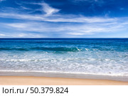Beautiful beach with white sand and blue water. Стоковое фото, агентство Ingram Publishing / Фотобанк Лори
