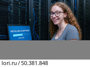 Young IT professional installing AI software in server room, data science, artificial intelligence, technology upgrade, computer systems, digital workplace, cloud management. Стоковое AI-изображение, AI-художник Павел Муравьев / Фотобанк Лори
