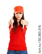 Beautiful young girl with thumbs down, isolated on white. Стоковое фото, агентство Ingram Publishing / Фотобанк Лори