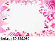 birthday gifts froot loops candies with party accessories white backdrop. Стоковое фото, агентство Ingram Publishing / Фотобанк Лори