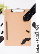 father tie clipboard. Стоковое фото, агентство Ingram Publishing / Фотобанк Лори