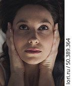 Beautiful woman with hands on the face. Стоковое фото, агентство Ingram Publishing / Фотобанк Лори