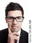 Funny portrait of a young businessman with a nerd glasses. Стоковое фото, агентство Ingram Publishing / Фотобанк Лори