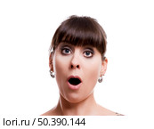Close-up portrait of a lovely woman with a astonish expression against white background. Стоковое фото, агентство Ingram Publishing / Фотобанк Лори