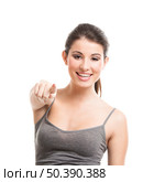 Portrait of a beautiful young woman pointing to somewhere, isolated on white. Стоковое фото, агентство Ingram Publishing / Фотобанк Лори