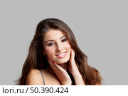 Studio portrait of a beautiful and expressive young woman. Стоковое фото, агентство Ingram Publishing / Фотобанк Лори