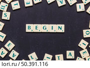 begin word arranged with scrabble letters. Стоковое фото, агентство Ingram Publishing / Фотобанк Лори