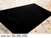 maps loupe black desk. Стоковое фото, агентство Ingram Publishing / Фотобанк Лори