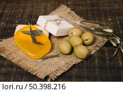 close up shot olives with soap bars sackcloth. Стоковое фото, агентство Ingram Publishing / Фотобанк Лори