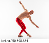 full shot man wearing red pants. Стоковое фото, агентство Ingram Publishing / Фотобанк Лори