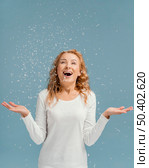 portrait woman laughing looking confetti 2. Стоковое фото, агентство Ingram Publishing / Фотобанк Лори