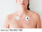 woman with electrodes body. Стоковое фото, агентство Ingram Publishing / Фотобанк Лори