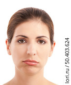 Close-up portrait of a young woman doing a pout expression, over a white background. Стоковое фото, агентство Ingram Publishing / Фотобанк Лори