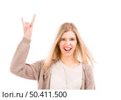 Beautiful blonde woman with a silly face and making gestures with her hands, isolated over white background. Стоковое фото, агентство Ingram Publishing / Фотобанк Лори