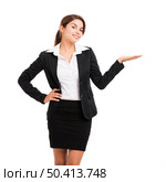 Beautiful hispanic business woman smiling over a white background and showing something. Стоковое фото, агентство Ingram Publishing / Фотобанк Лори