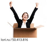 Happy business woman appear inside a big card box, isolated over white background. Стоковое фото, агентство Ingram Publishing / Фотобанк Лори