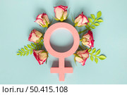 top view female symbol surrounded by flowers women s day. Стоковое фото, агентство Ingram Publishing / Фотобанк Лори