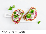 Sandwiches, toasts with salted herring and beetroot pate, top view. Стоковое фото, агентство Ingram Publishing / Фотобанк Лори