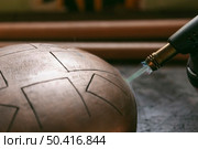 welding torch artisan work concept. Стоковое фото, агентство Ingram Publishing / Фотобанк Лори