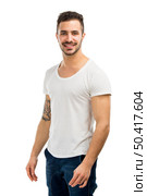 Beautiful latin man smiling, isolated on white background. Стоковое фото, агентство Ingram Publishing / Фотобанк Лори
