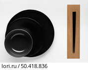 flat lay chopsticks with dinnerware. Стоковое фото, агентство Ingram Publishing / Фотобанк Лори