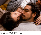 high angle couple napping together. Стоковое фото, агентство Ingram Publishing / Фотобанк Лори