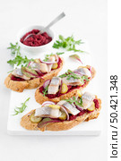 Sandwiches, toasts with salted herring and beetroot pate. Стоковое фото, агентство Ingram Publishing / Фотобанк Лори