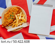 top view fish chips plate with notebook great britain flag. Стоковое фото, агентство Ingram Publishing / Фотобанк Лори