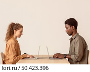colleagues working their laptops. Стоковое фото, агентство Ingram Publishing / Фотобанк Лори