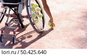 close up hand holding tennis balls. Стоковое фото, агентство Ingram Publishing / Фотобанк Лори