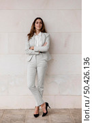 front view elegant businesswoman posing outdoors. Стоковое фото, агентство Ingram Publishing / Фотобанк Лори