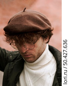 young man wearing french hat. Стоковое фото, агентство Ingram Publishing / Фотобанк Лори
