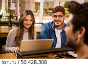 Friends studying together for the upcoming exams. Стоковое фото, агентство Ingram Publishing / Фотобанк Лори