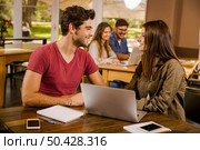 Studying working together for the final exams. Стоковое фото, агентство Ingram Publishing / Фотобанк Лори