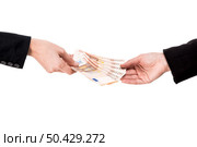 Concept image of hands making and receiving a payment, isolated over white background. Money exchange. Стоковое фото, агентство Ingram Publishing / Фотобанк Лори