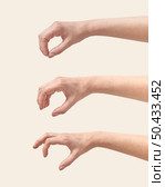 Three female hands making the gesture that measuring or size or girth, thickness with fingers, vertical looking down isolated on cream background. Hand with fingers open steps.. Set of female hand grip gesture on white. Стоковое фото, агентство Ingram Publishing / Фотобанк Лори