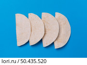 top view tortillas blue background. Стоковое фото, агентство Ingram Publishing / Фотобанк Лори