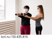 women training together after coronavirus treatment. Стоковое фото, агентство Ingram Publishing / Фотобанк Лори