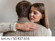 adult woman hugging her husband 7. Стоковое фото, агентство Ingram Publishing / Фотобанк Лори