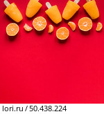 flat lay yummy popsicles with copy space orange. Стоковое фото, агентство Ingram Publishing / Фотобанк Лори