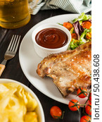 high angle steak plate with chips beer. Стоковое фото, агентство Ingram Publishing / Фотобанк Лори