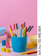 desk arrangement with colorful pens. Стоковое фото, агентство Ingram Publishing / Фотобанк Лори