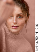 portrait beautiful woman with pink sweater. Стоковое фото, агентство Ingram Publishing / Фотобанк Лори
