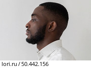 sideways black person looking away. Стоковое фото, агентство Ingram Publishing / Фотобанк Лори