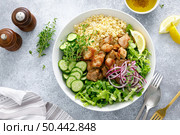 Pork kebab bulgur salad bowl with cucumber, lettuce, thyme and mustard sauce. Стоковое фото, агентство Ingram Publishing / Фотобанк Лори