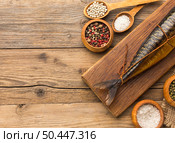 delicious smoked fish wooden board. Стоковое фото, агентство Ingram Publishing / Фотобанк Лори