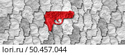 Gun violence and firearms in society concept as a gun among a community of people representing prevention of violent crime with guns or firearm legislation and mass shooting safety laws. Стоковое фото, агентство Ingram Publishing / Фотобанк Лори