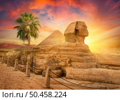 Famous egyptian sphinx in desert of Cairo. Egyptian sphinx in desert. Стоковое фото, агентство Ingram Publishing / Фотобанк Лори