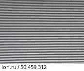 Corrugated metal texture surface background. Aluminium-zinc coating texture Curved. Стоковое фото, агентство Ingram Publishing / Фотобанк Лори